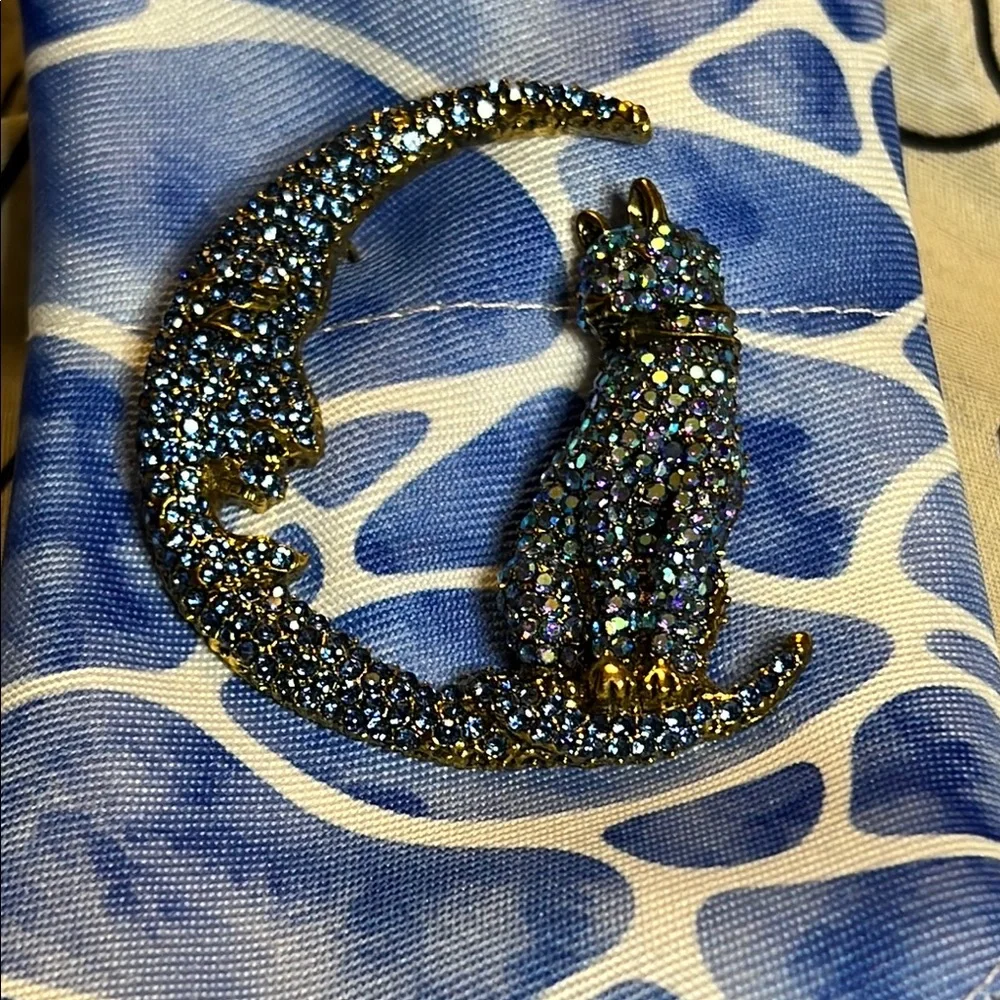 BETSEY Johnson’s Sparkling Blue and Gold Cat Brooch